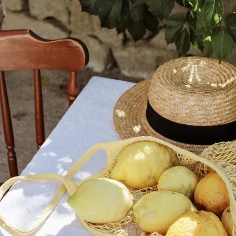 Lemons, hat and summer in Italy. 