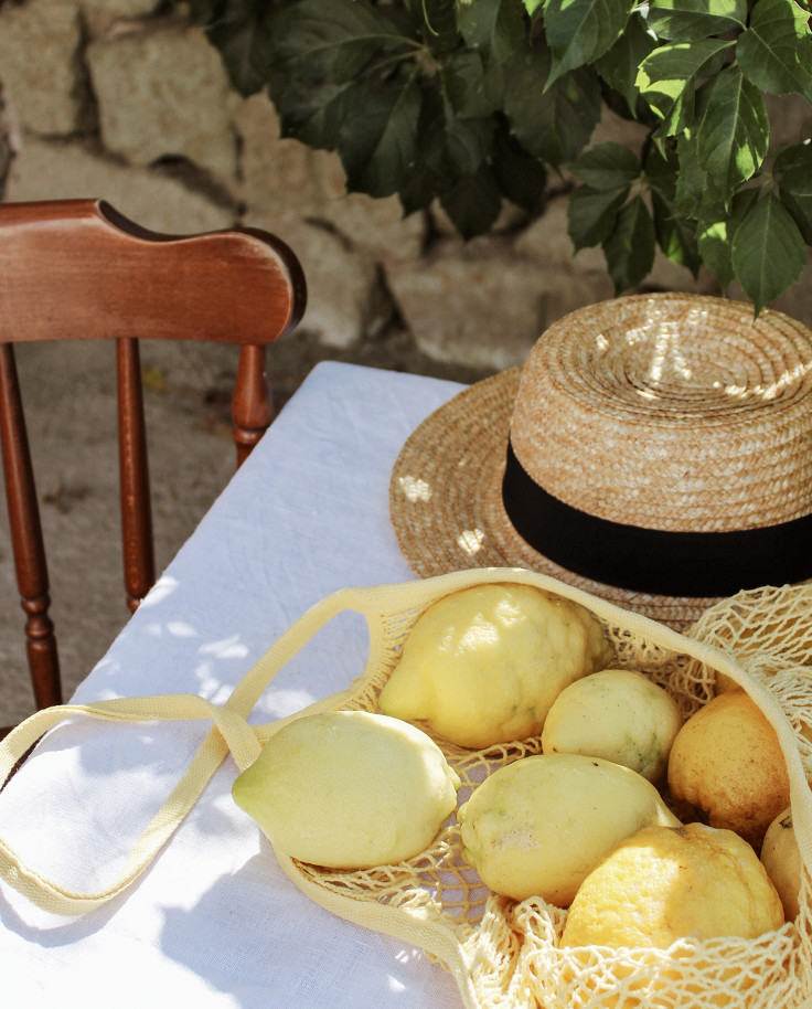 Lemons, hat and summer in Italy. 