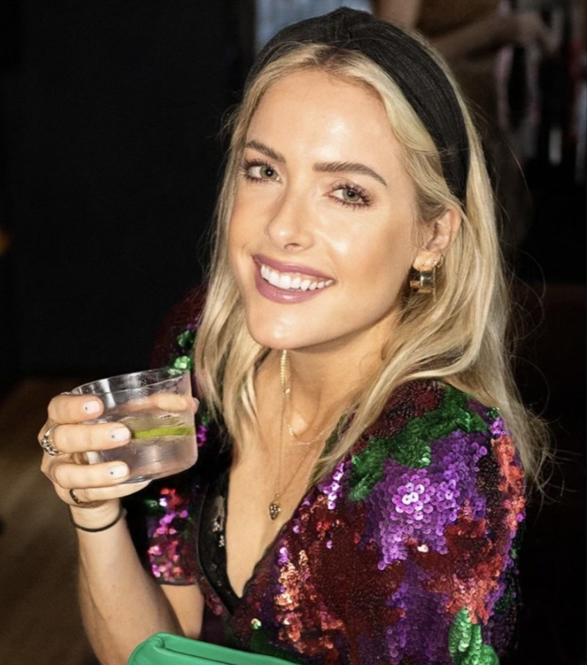 Caitlin Clark holding a drink