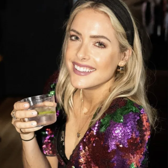 Caitlin Clark holding a drink