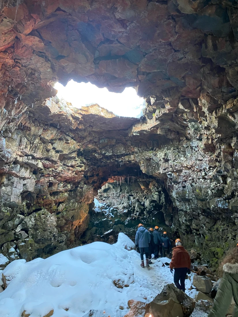 People walking in a cave