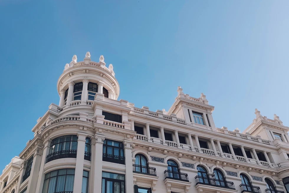 A white building with blue sky in Madrid, Spain.