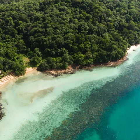 Koh Change island with blue ocean waters.