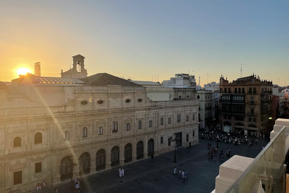 large building with the sunset