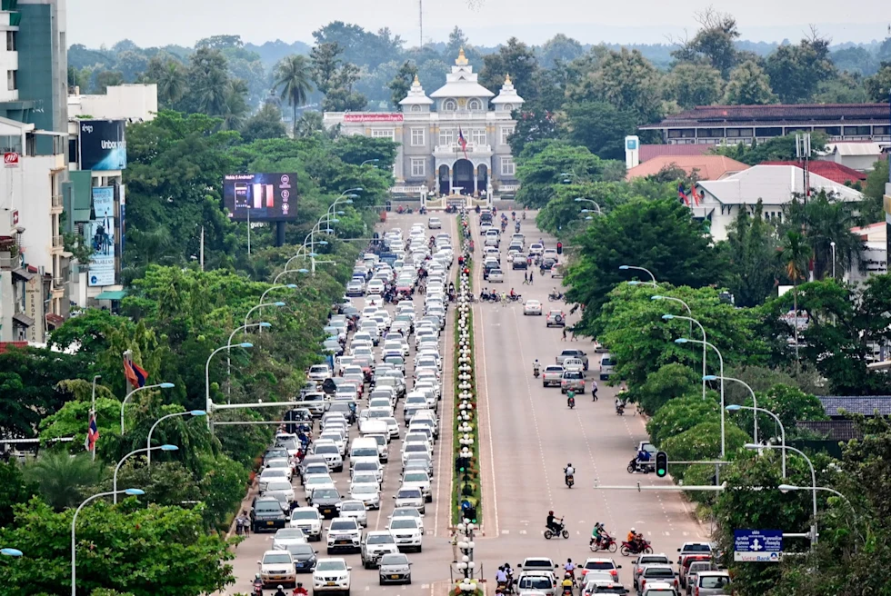 An aerial view of a road with traffic.