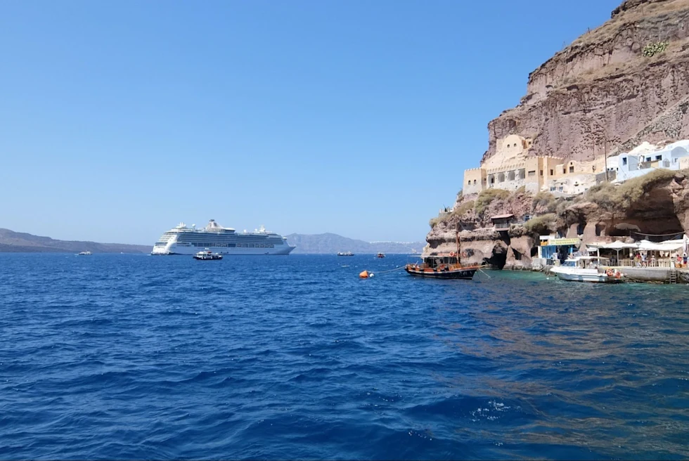 deep blue ocean off Greecian island with boats