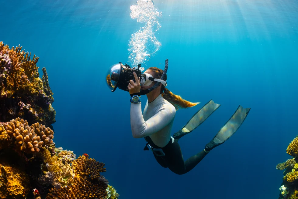 A girl under water snorkeling