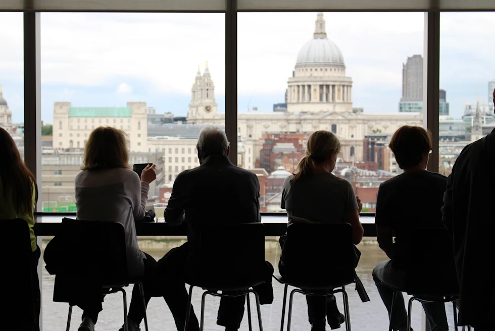 A bar with London city view through the windows.