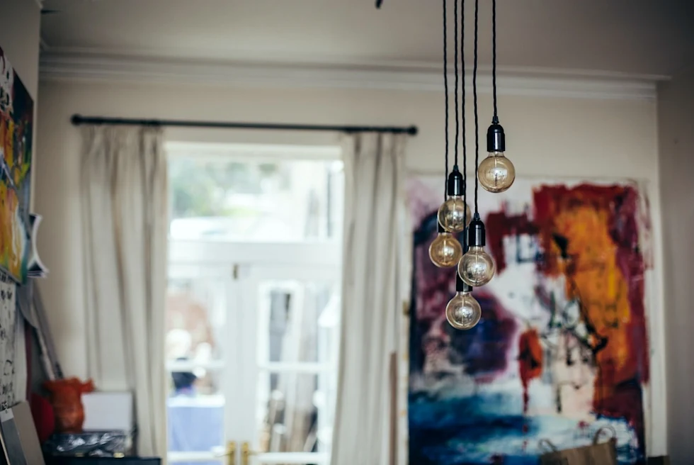 lightbulbs hanging in a chic art store