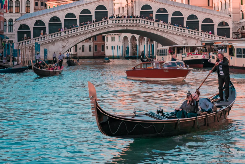 People enjoying boating in Venice