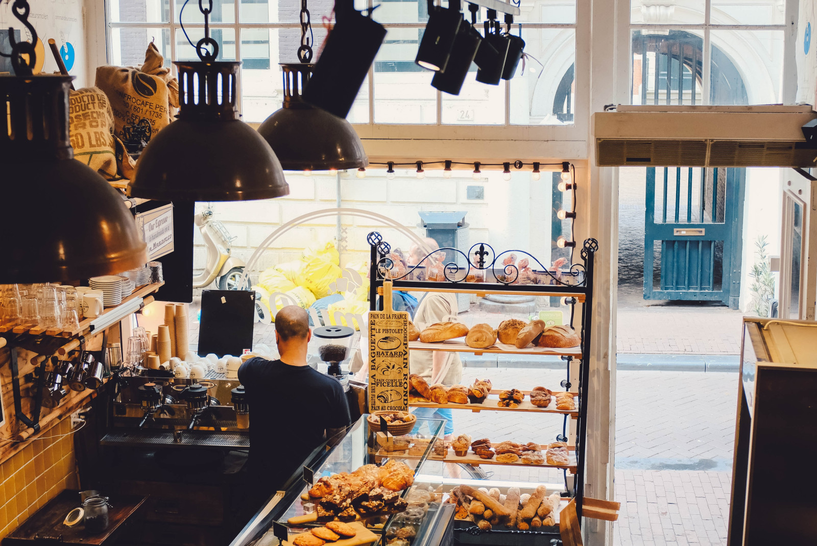 Bakery with case of baked goods during daytime