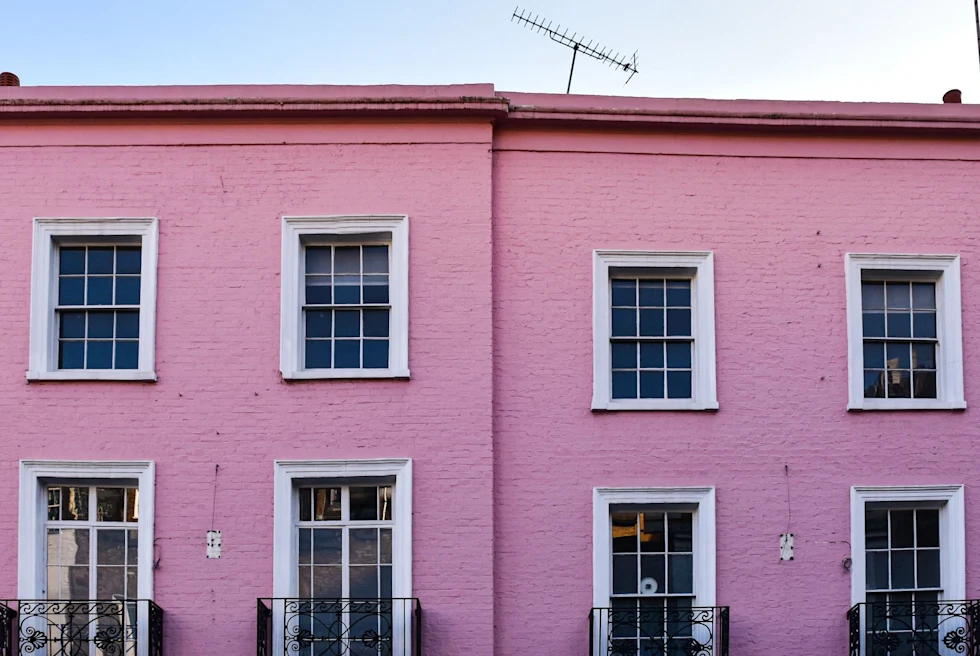 two small pink buildings