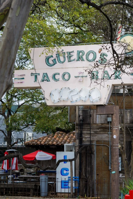 Sign reads "Gueros taco bar" in Austin, TX