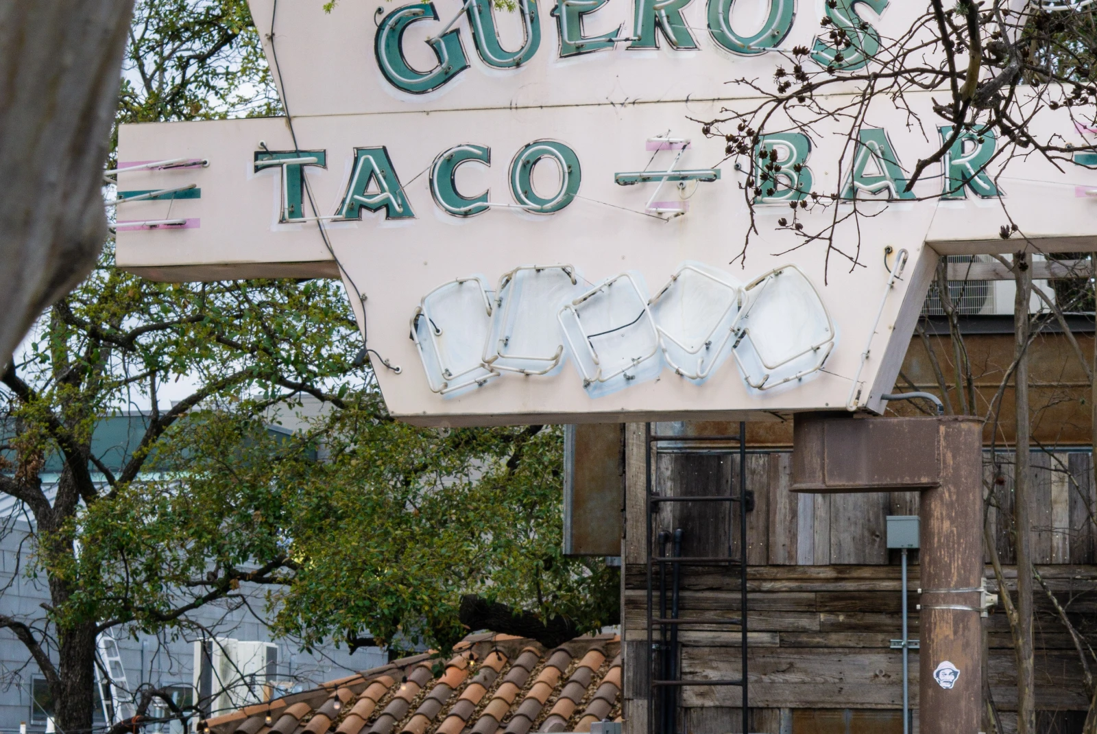 Sign reads "Gueros taco bar" in Austin, TX