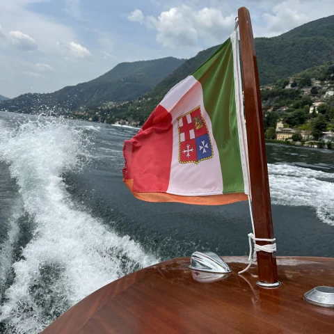 flag on a boat waves in the wind