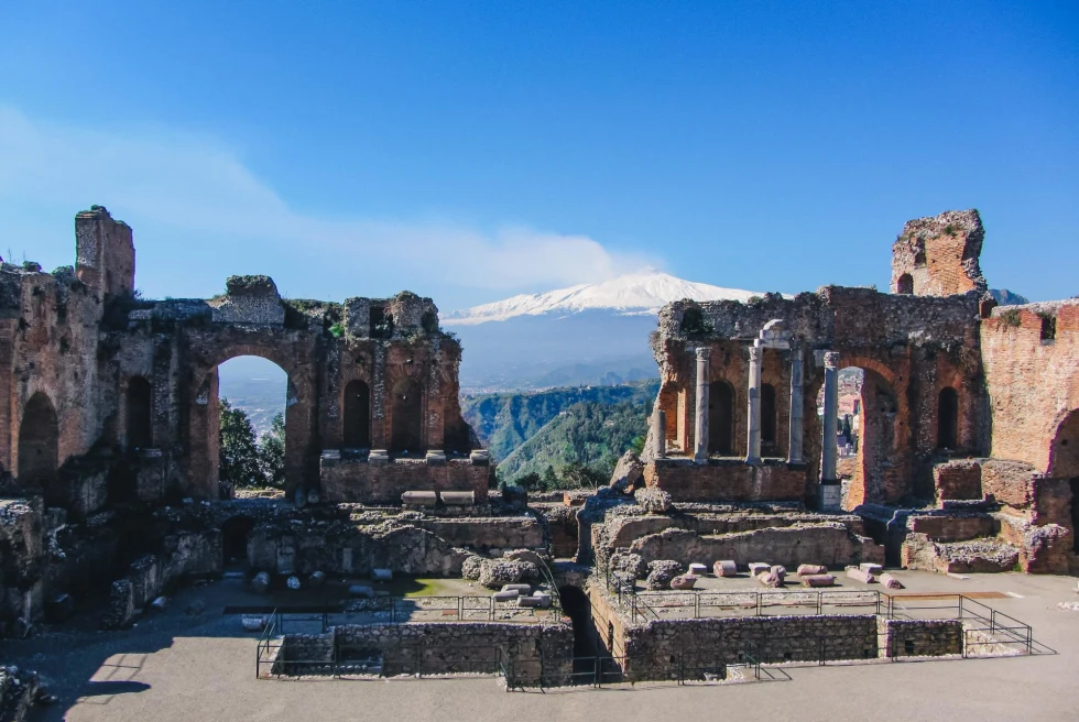 ancient outdoor theater made of stone at the top of a mountain range