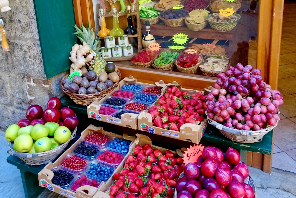 A stall of fruits and spices. 