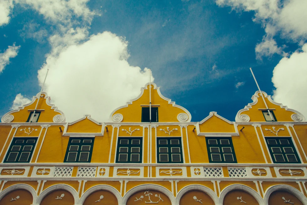 Yellow building with a blue sky in Curacao