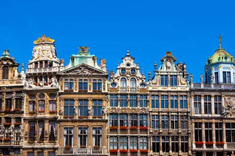colorful European buildings against a blue sky