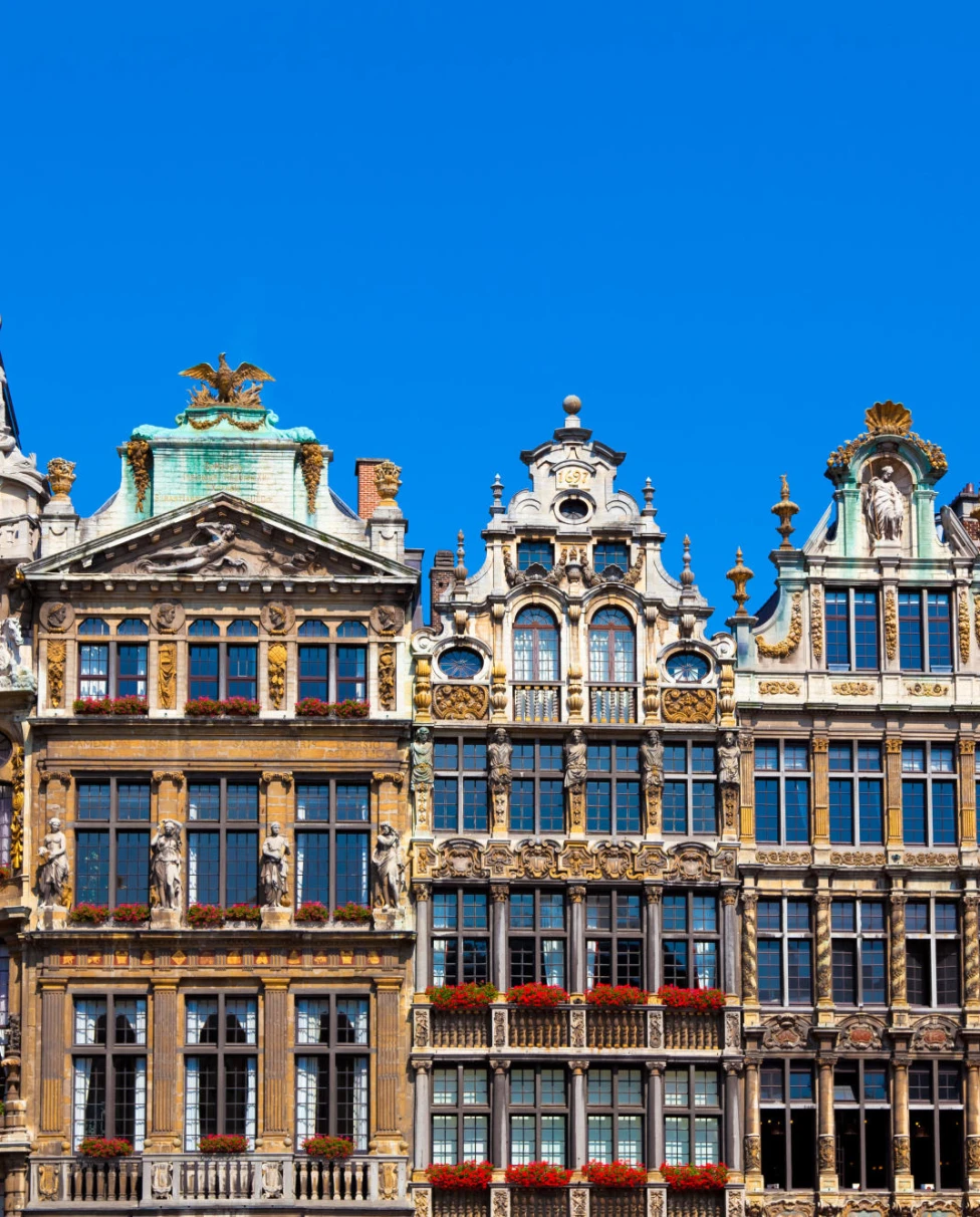 colorful European buildings against a blue sky