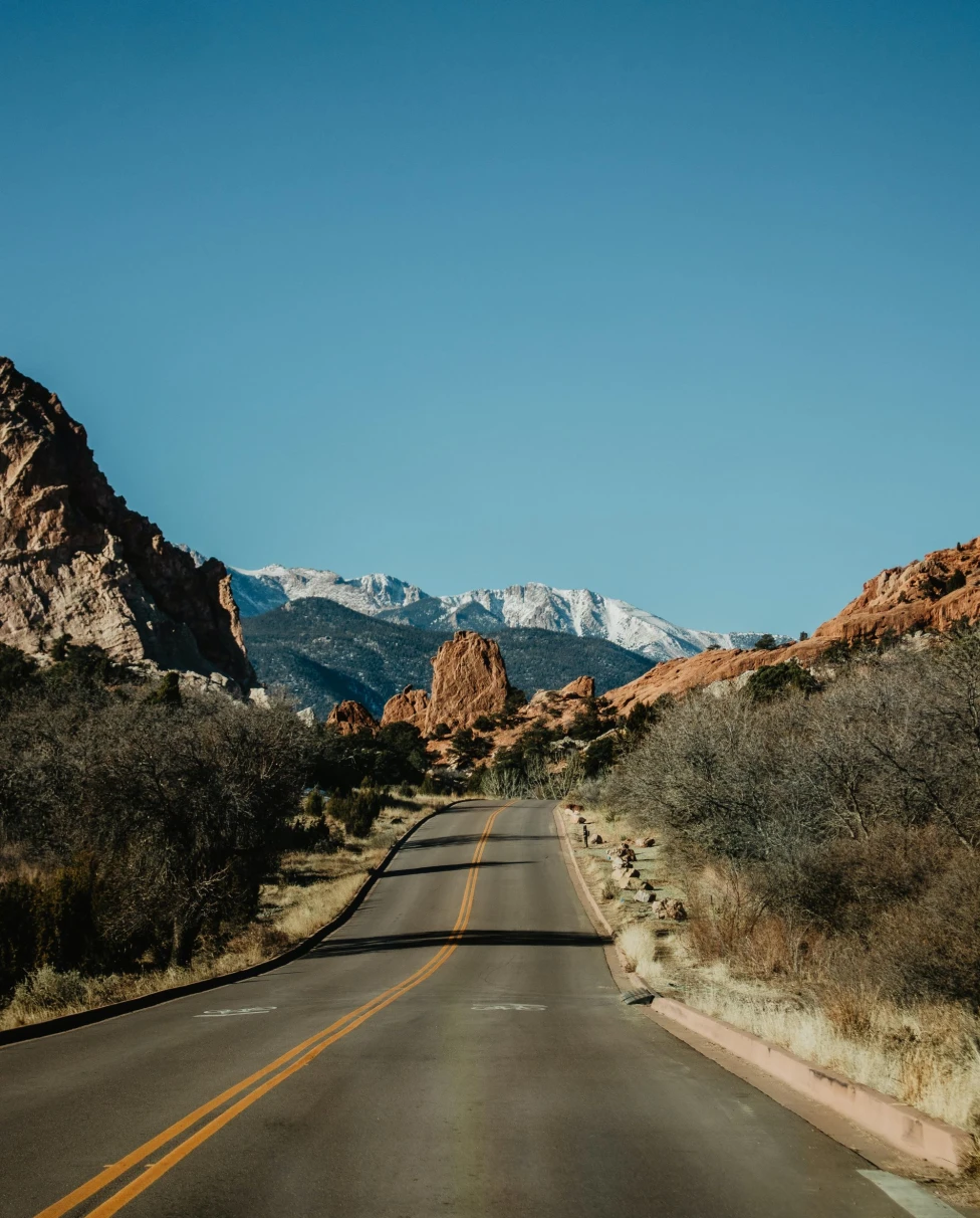 scenic road amid a red-rock mountain range