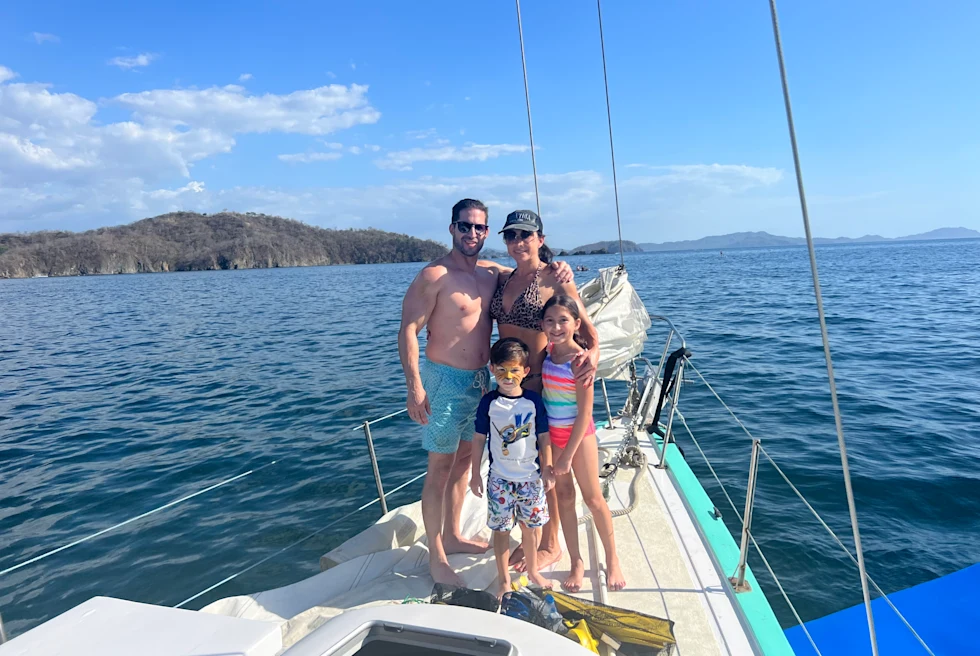 Family enjoying cruising in the sea