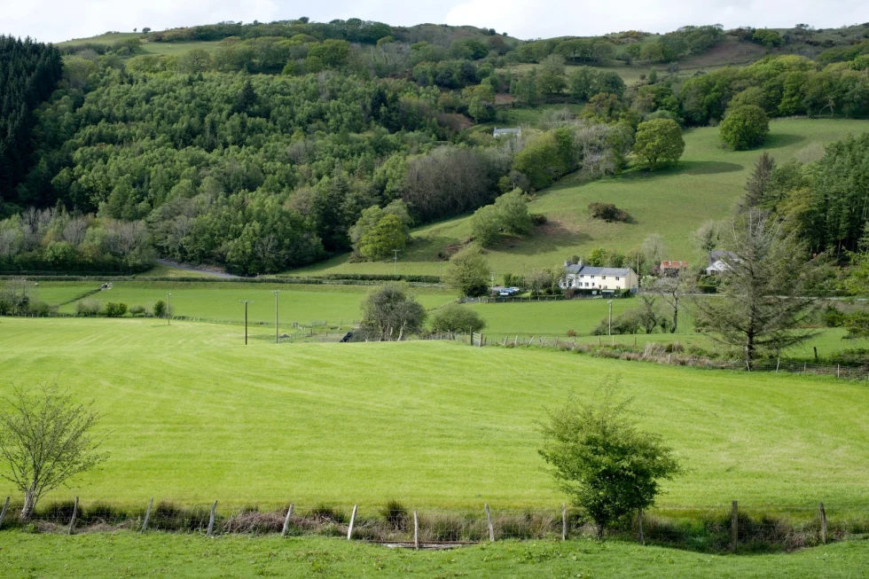  Wye Valley with green rolling hills in Wales. 
