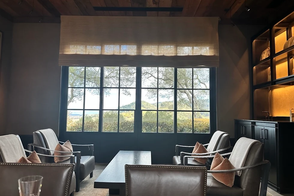 chairs and a table in a handsome tasting room
