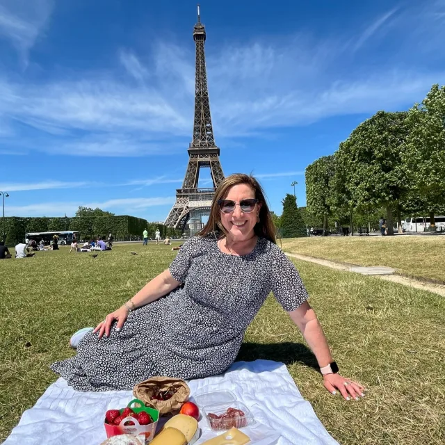 mindy having picnic near eiffle tower