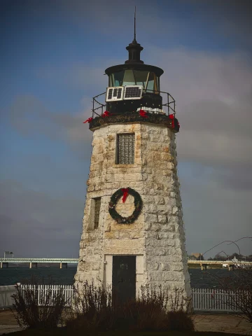 lighthouse with holiday decorations