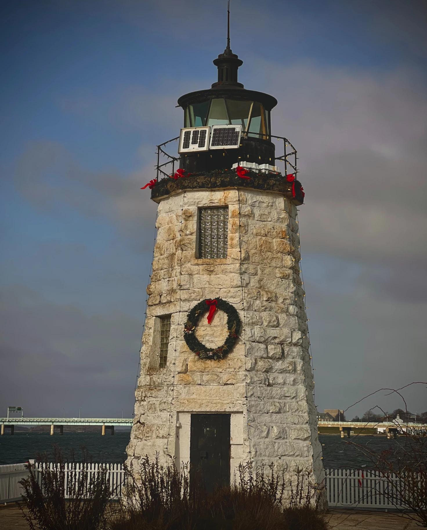 lighthouse with holiday decorations