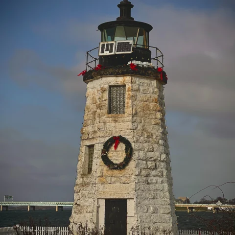 lighthouse with holiday decorations