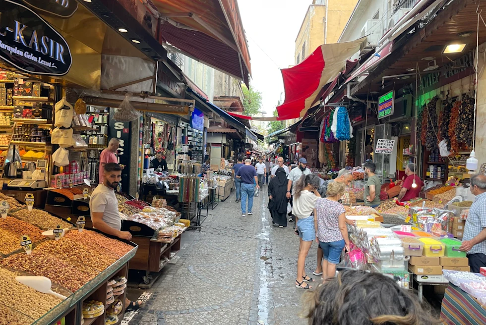 A food market with stalls and people.