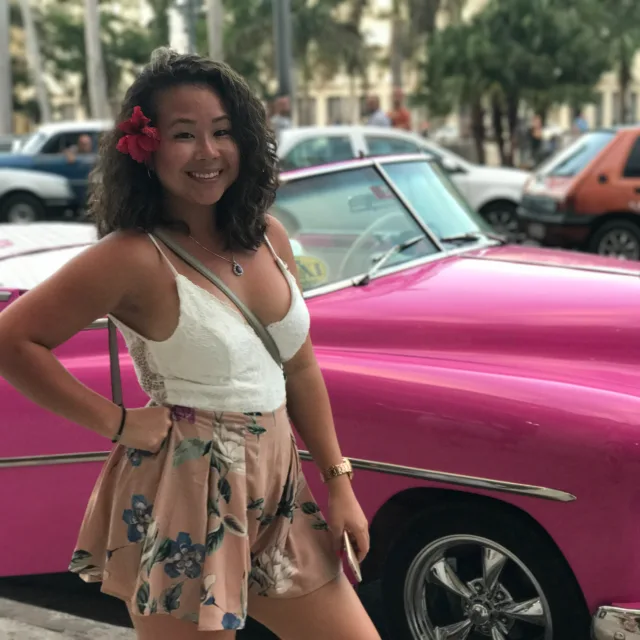 Picture of Brittany with a pink car