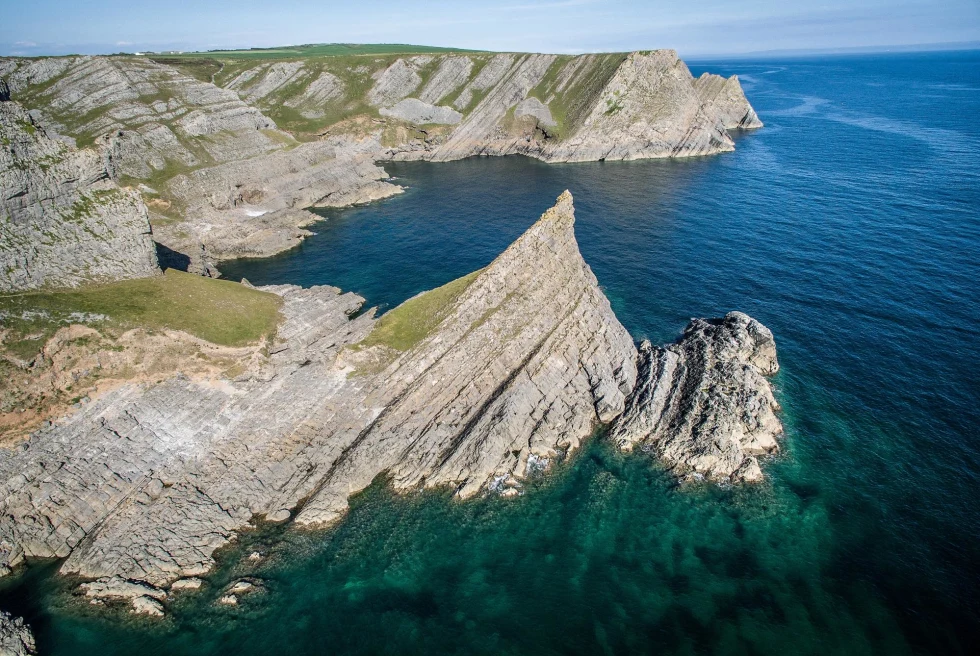 cliffs jet off over the ocean