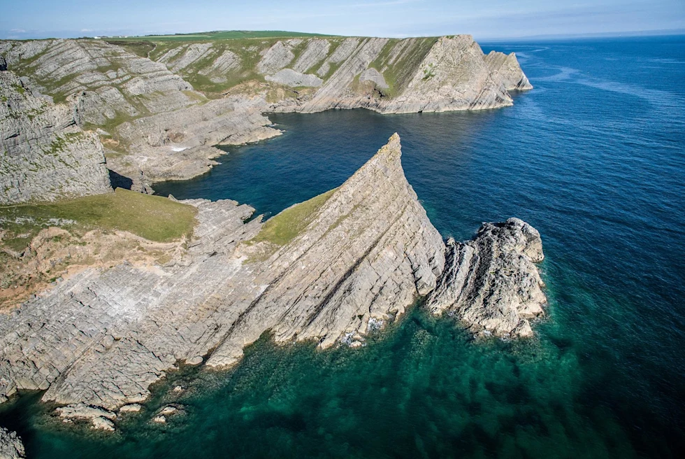 cliffs jet off over the ocean