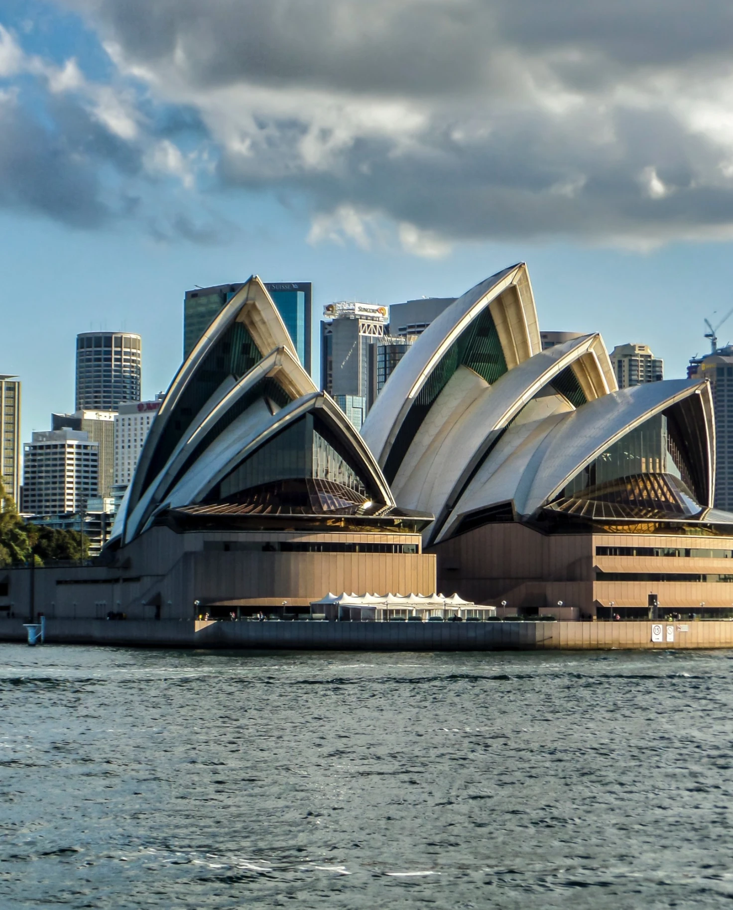 A view of the Sydney opera house from across the water.