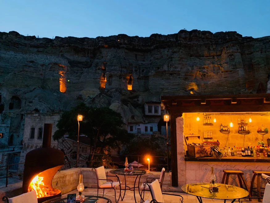 rooftop restaurant at night set in a cave