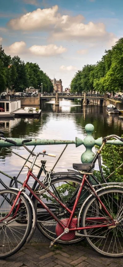 bicycles on a bridge over an Amsterdam canal 
