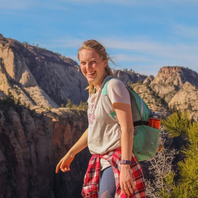 Travel advisor Leigh Ann Blalock hiking in the hills above the southwest desert.