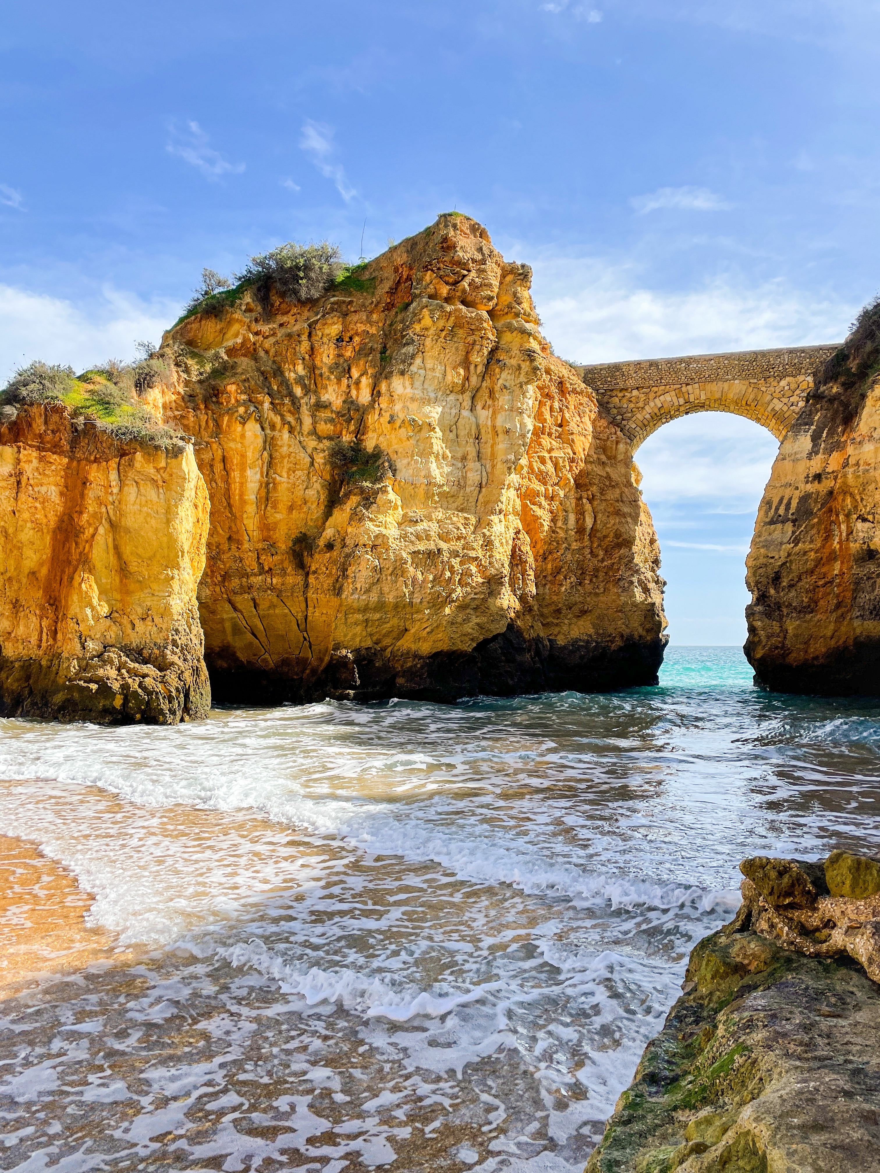 A view of a beach and rock formations in Lagos.