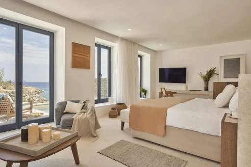 a sleek hotel room overlooking the ocean