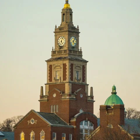 A tower with clock on top of it. 