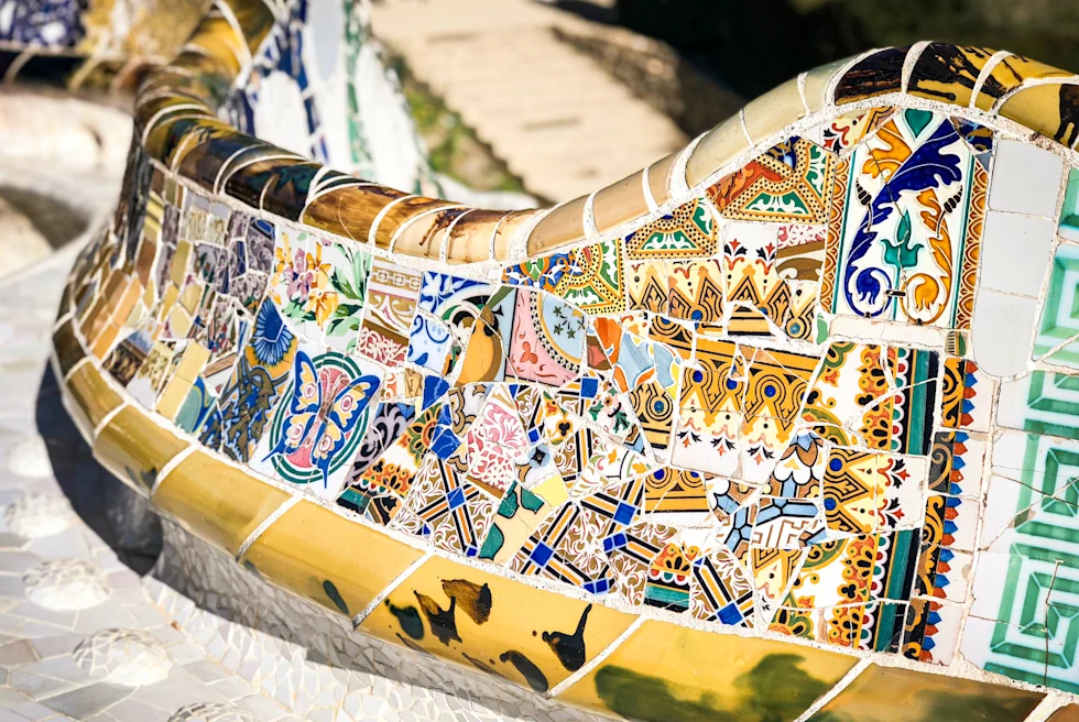 Colorful tiles on a bench at Park Guell in Barcelona, Spain.