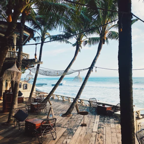 Wooden hut hotel in Bali with ocean views. 