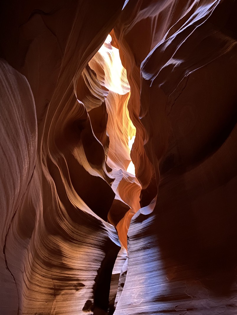 Red canyon with sunlight filtering in