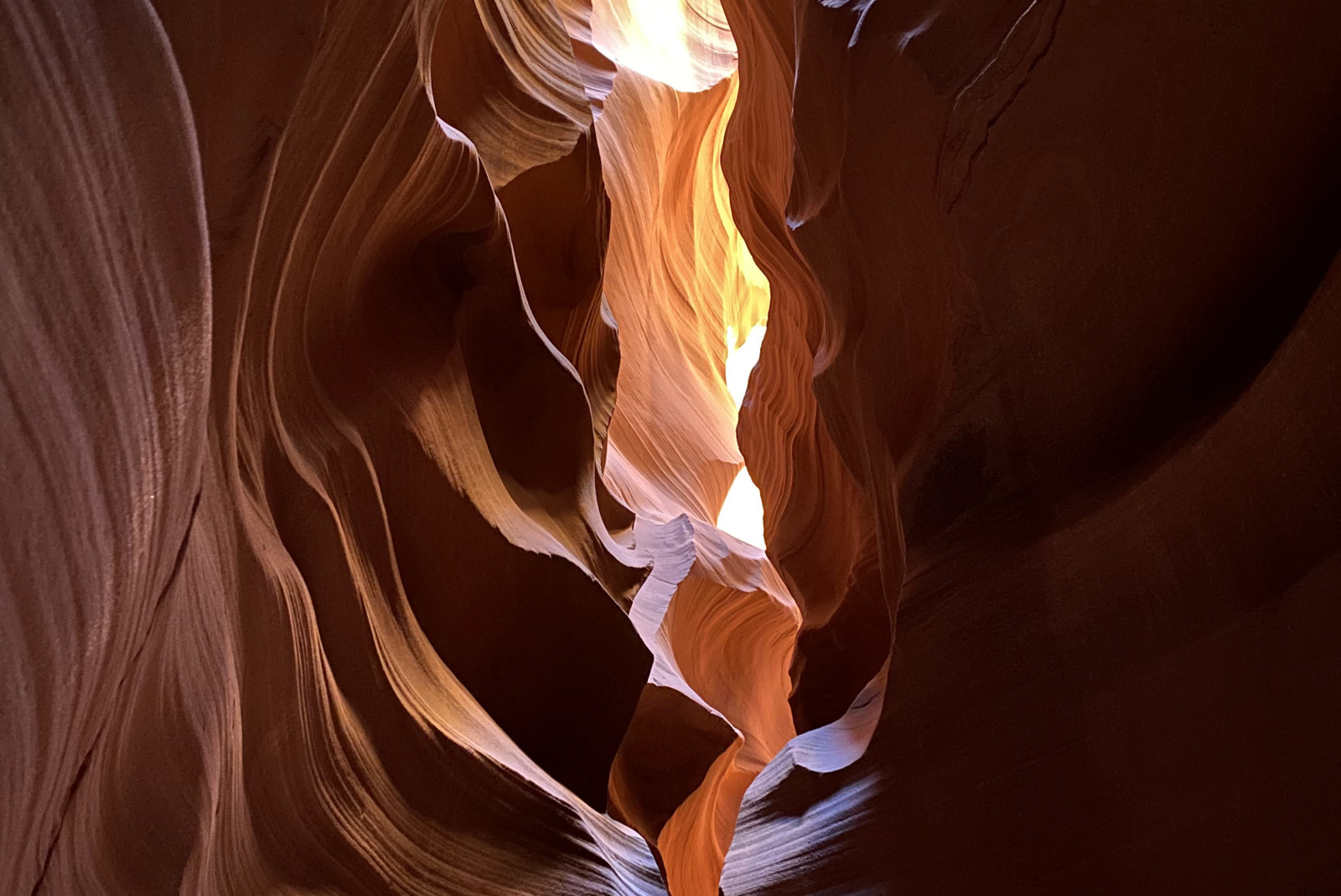 Red canyon with sunlight filtering in