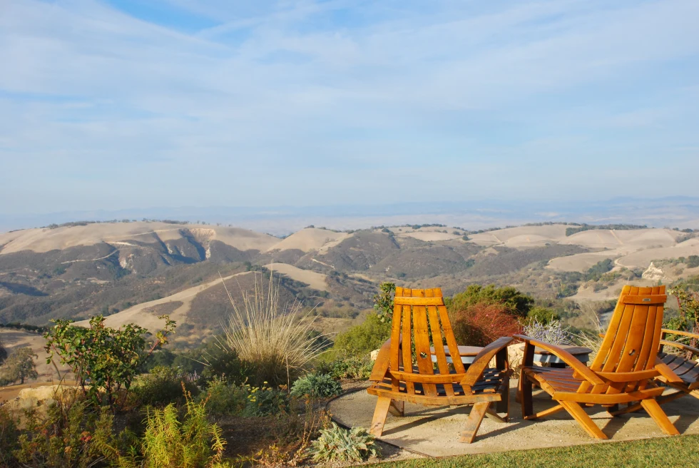 Paso Robles mountains overview with two Adirondack chairs. 