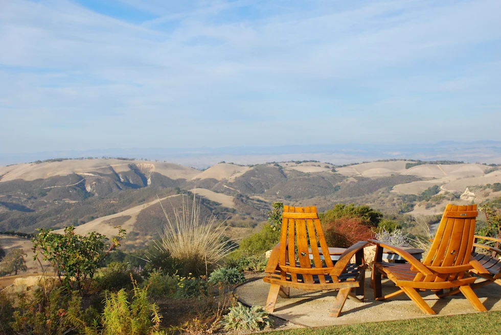 Paso Robles mountains overview with two Adirondack chairs.