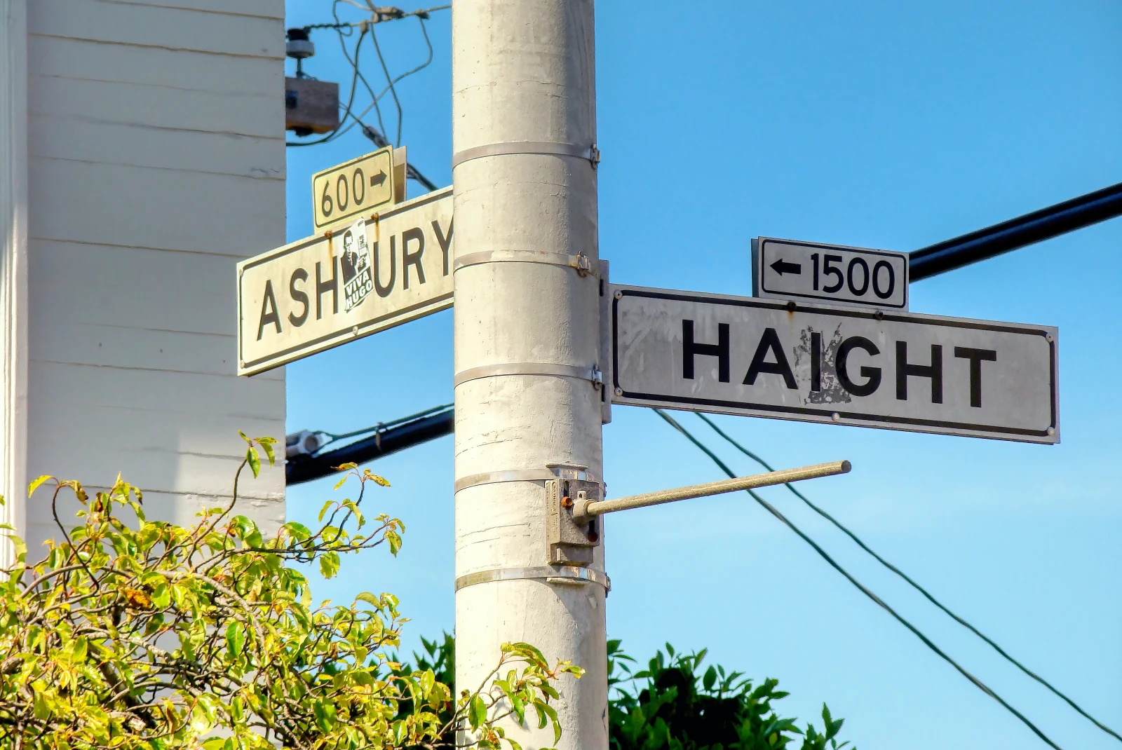 two street signs during daytime
